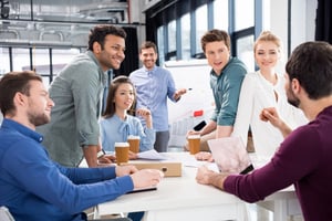 Business team listening to co-workers story